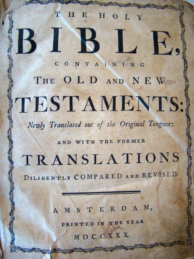 An 18th century HOLY BIBLE written in English and published in Amsterdam in 1730